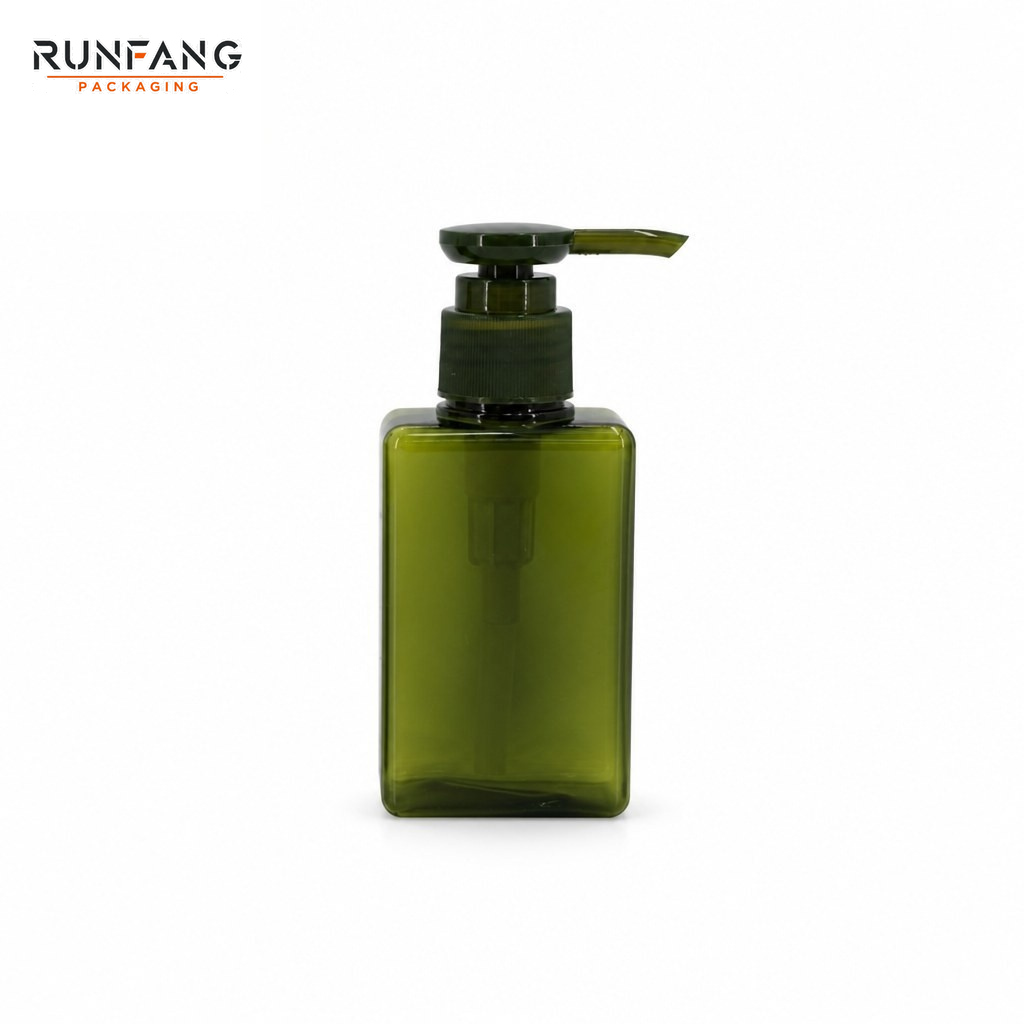 Botella vacía de PETG verde de 100 ml / 3,38 fl.oz con tapón dosificador.