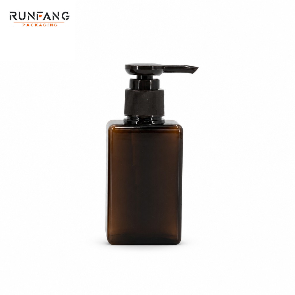 Botella vacía de PETG color ámbar de 100 ml / 3,38 fl.oz con tapón dosificador.