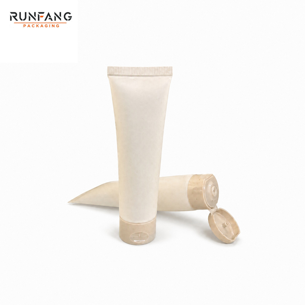Tubo cosmético de paja de trigo de 25 mm de diámetro con tapa abatible.
